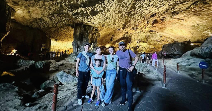 Visitors experience Sung Sot Cave (Surprising Cave)