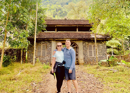 The excursion team takes guests to Viet Hai Village. Guests can cycle through the village, visit fish ponds, bee farms, traditional houses, or try a fish foot massage.