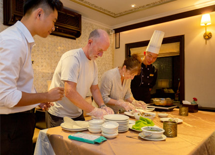 Vietnamese cooking class with our chef on Heritage Line Violet Cruise